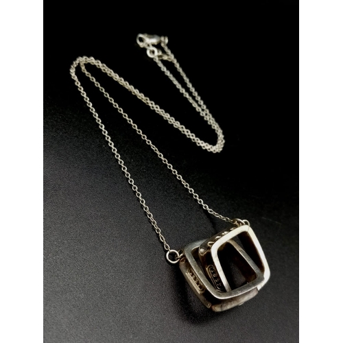 91 - Two Vintage Tiffany and Co 1837 - 925 Silver, Square Pendants on a silver chain.