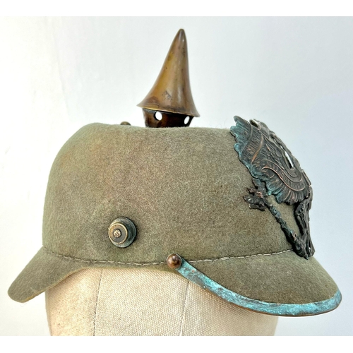 204 - WW1 Imperial German Army Prussian M15 Pickelhaube Uniform Helmet. A felt constructed example with
ni... 