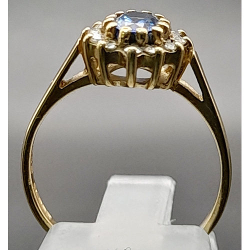 207 - A Vintage 9K Yellow Gold Ceylon Sapphire and Diamond Ring. The oval Ceylon sapphire punches well abo... 