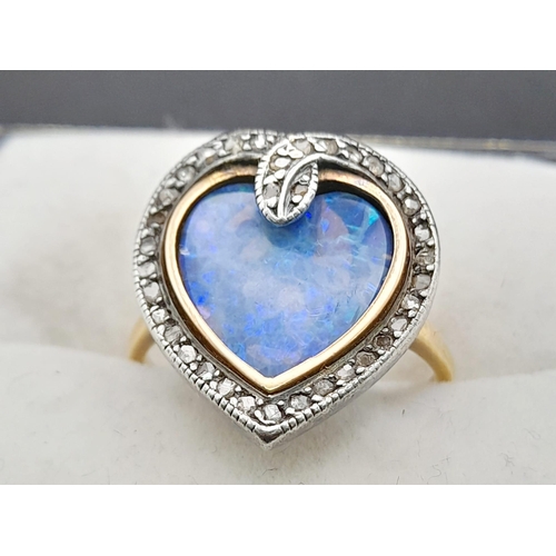 221 - An Antique 18K Gold Georgian Black Harlequin Opal Ring. Heart-shaped with a diamond serpentine surro... 