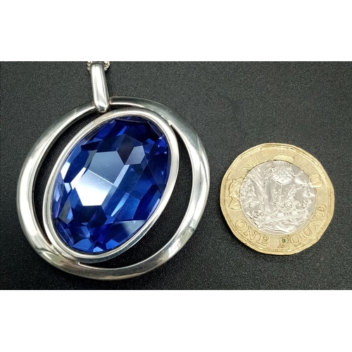 597 - New Sterling Silver 3cm Length Oval Cut Tanzanite Colour Zircon Set. Necklace 50cm Length chain, Pen... 