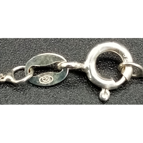 597 - New Sterling Silver 3cm Length Oval Cut Tanzanite Colour Zircon Set. Necklace 50cm Length chain, Pen... 