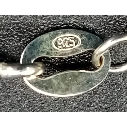 597 - New Sterling Silver 3cm Length Oval Cut Tanzanite Colour Zircon Set. Necklace 50cm Length chain, Pen... 