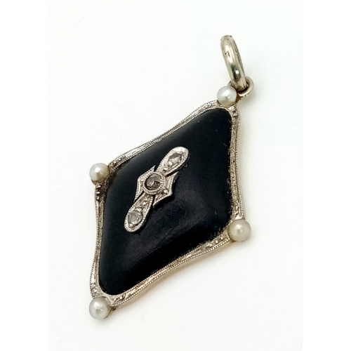 235 - An Art Deco, Enamel, Diamond, 18k gold and Platinum Pendant. 3cm. 2.34g total weight.