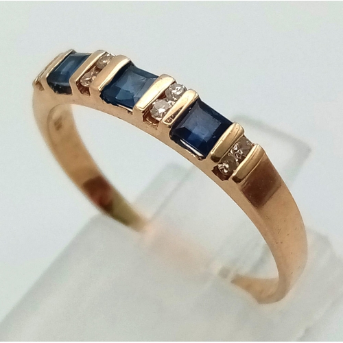 163 - A 9 K yellow gold, diamond (0.10 carats) and sapphire 0.35 carats) band ring. size: P1/2 , weight: 1... 