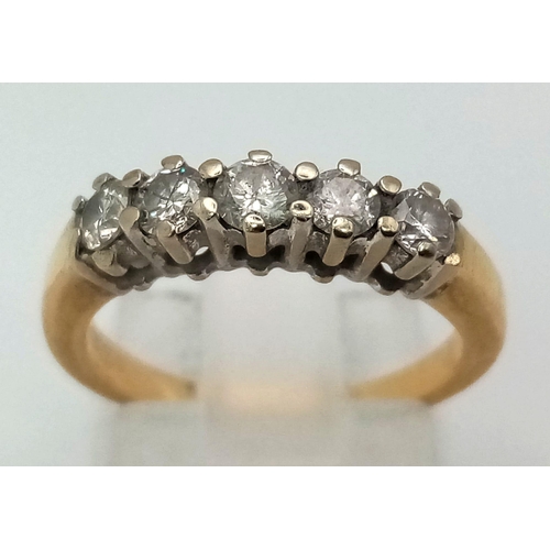 226 - An 18 K yellow gold ring with five diamonds (0.50 carats). Ring size: J, weight: 3.5 g.