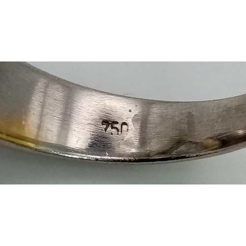 566 - An 18 K white gold diamond set heart ring with floating diamonds. Ring size: M, weight: 9.1 g.