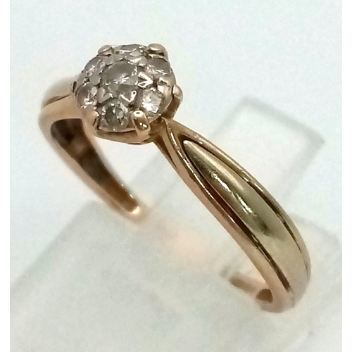 670 - A 9 K yellow gold diamond (0.20 carats) cluster ring. Size: m, weight: 1.5 g.