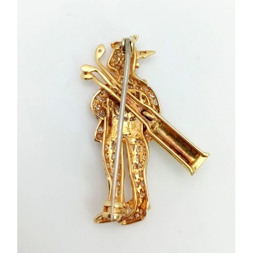 72 - An 18 K yellow gold, diamond (1.50 carats) set rabbit golfer brooch, possibly by Raymond Yard. Weigh... 