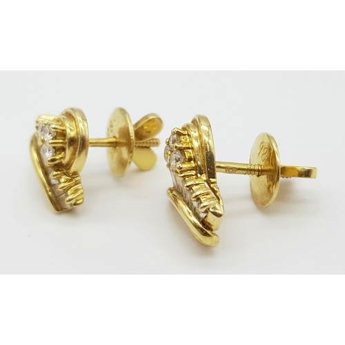 184 - An 18 K yellow gold pair of diamond (0.60 carats) stud earrings. Weight: 6.5 g.