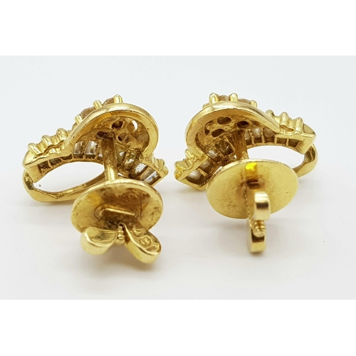 184 - An 18 K yellow gold pair of diamond (0.60 carats) stud earrings. Weight: 6.5 g.