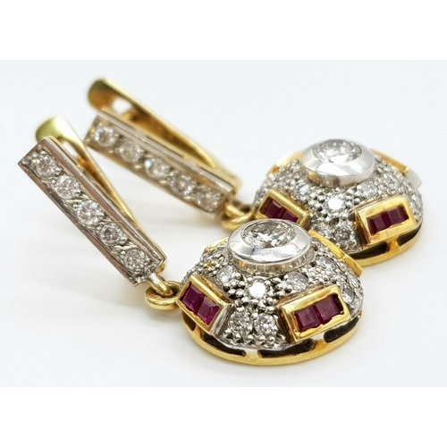 219 - A vintage, 18 K yellow gold pair of earrings with diamonds ( 1 carat appr.) and rubies. weight: 8.6 ... 