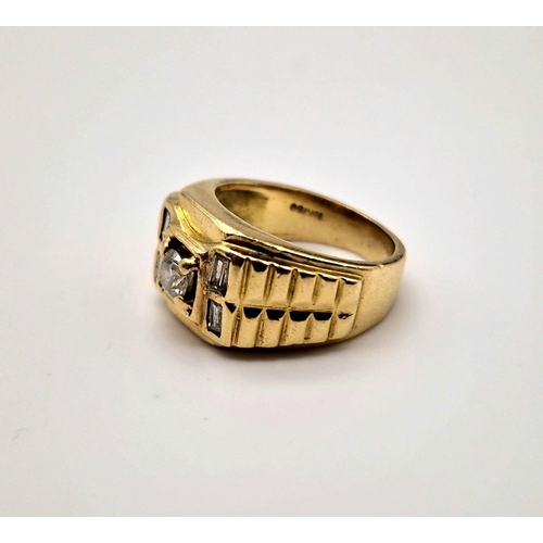 13 - An 18 K yellow gold ring. Rolex style with round (0.45 carats) and baguette (0.25 carats) diamonds. ... 