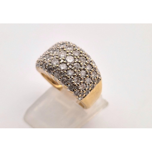 51 - A 9 K yellow gold, diamond (1,70 carats) band ring. Size: K, weight: 6.1 g.