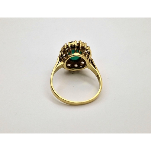 58 - An 18 K yellow gold, stone set cluster ring. Size: Q, weight: 5.6 g.