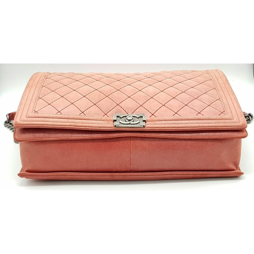 193 - A Chanel Maxi Boy Shoulder Bag. Pink quilted suede flap on leather. Heavy brushed steel finish on ha... 