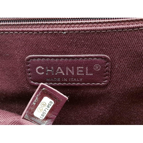 193 - A Chanel Maxi Boy Shoulder Bag. Pink quilted suede flap on leather. Heavy brushed steel finish on ha... 