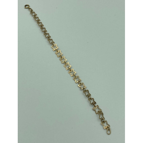 182 - 9 carat GOLD BRACELET having connecting four point Stars and complete with full UK Hallmark. 2.48 gr... 