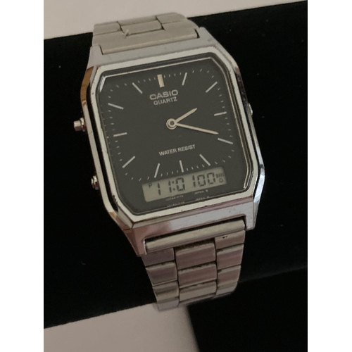 203 - Vintage CASIO DIGITAL WRISTWATCH AQ-230. Black face stainless steel model in full working order. Fac... 