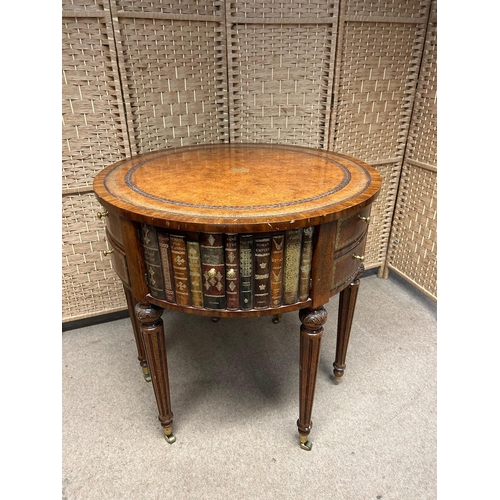 138 - Maitland Smith Round Leather-Wrapped Book Motif Design Side Table on Castors. There are three sets o... 