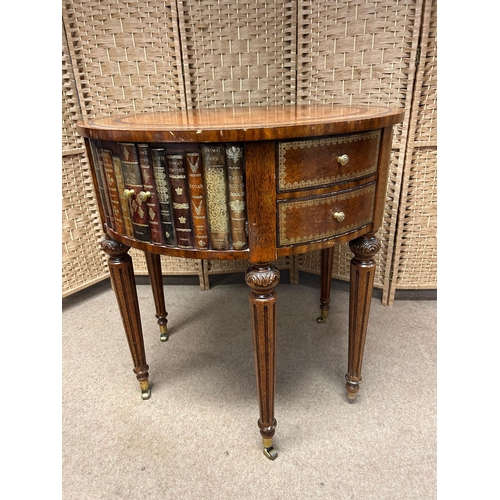 138 - Maitland Smith Round Leather-Wrapped Book Motif Design Side Table on Castors. There are three sets o... 