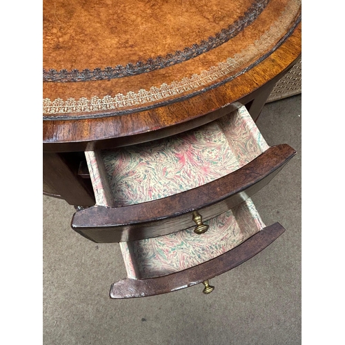 138 - Maitland Smith Round Leather-Wrapped Book Motif Design Side Table on Castors. There are three sets o... 