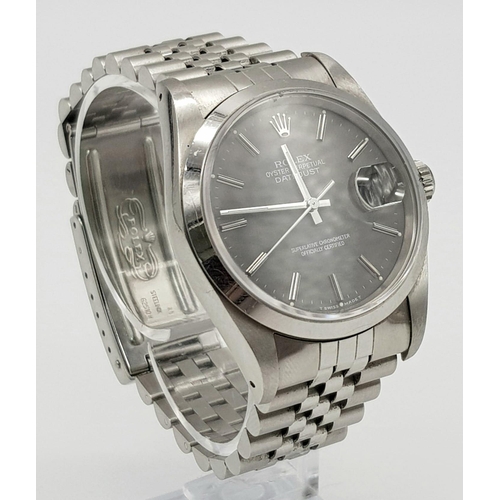 1 - A Rolex Oyster Perpetual Datejust Gents Watch. Stainless steel strap and case - 36mm. Beautiful grey... 