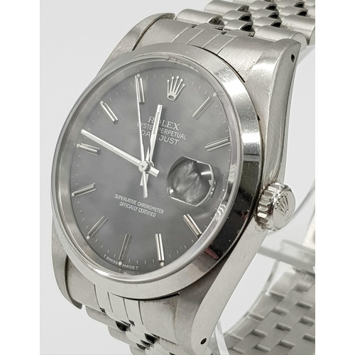 1 - A Rolex Oyster Perpetual Datejust Gents Watch. Stainless steel strap and case - 36mm. Beautiful grey... 