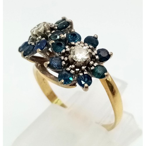 177 - A vintage, 18 K yellow gold ring with a double cluster with diamonds (0.30 carats) and sapphires. Ri... 