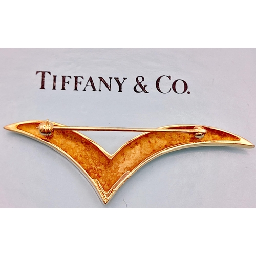 201 - A Tiffany and Co. 18k Yellow Gold Chevron Brooch. 5.5cm. 6.61g. Comes with a Tiffany Box. Ref: 11742