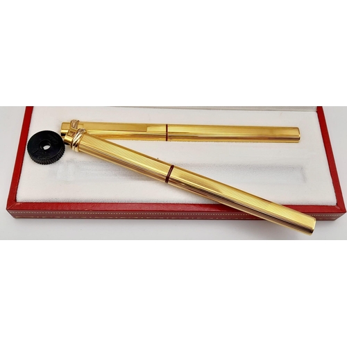 132 - Two Must de Cartier Gold Plated Pens in a Cartier Case. A fountain pen and a Ballpoint pen. Both 14c... 