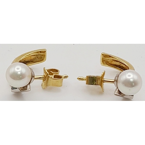 129 - A Pair of 18K Yellow Gold, Emerald and Pearl Earrings. 5.14g total weight. Ref: 11926