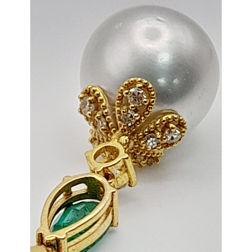 118 - A Pair of High Karat Gold, Large South Sea Pearl, Emerald and Diamond Earring and Pendant Set. 4cm d... 