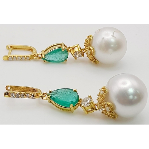 118 - A Pair of High Karat Gold, Large South Sea Pearl, Emerald and Diamond Earring and Pendant Set. 4cm d... 