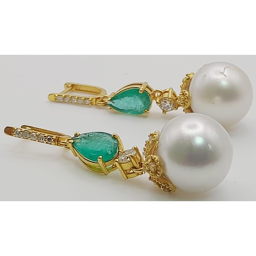 118 - A Pair of High Karat Gold, Large South Sea Pearl, Emerald and Diamond Earring and Pendant Set. 4cm d... 