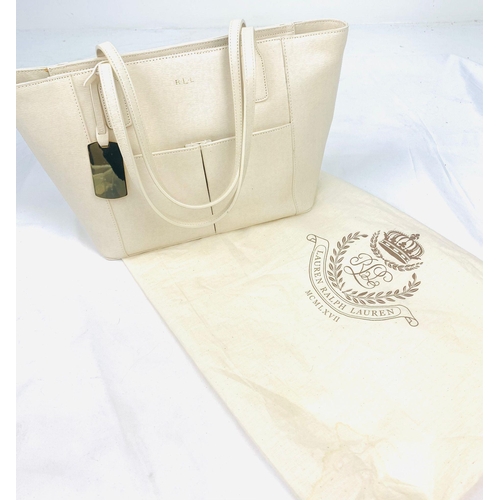 2 - A Ralph Lauren Cream Leather Handbag. Two exterior flaps. Zipped inner compartment. 36cm width. 26cm... 