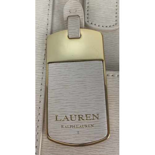 2 - A Ralph Lauren Cream Leather Handbag. Two exterior flaps. Zipped inner compartment. 36cm width. 26cm... 