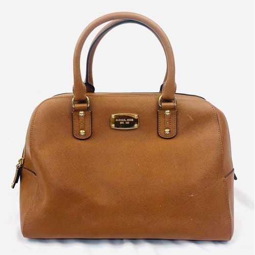 229 - A Michael Kors Brown Mid-Size Leather Shoulder Bag. Textured finish with gilded touches. Comes with ... 