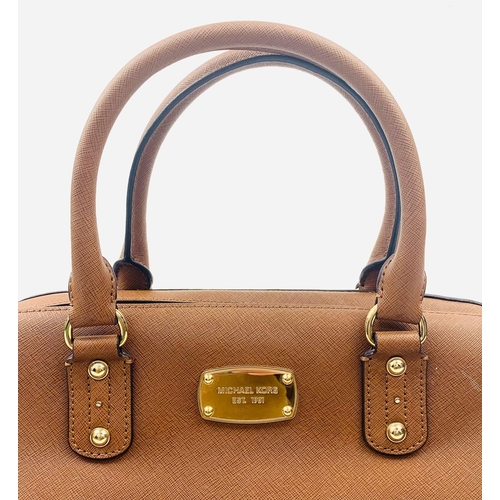 229 - A Michael Kors Brown Mid-Size Leather Shoulder Bag. Textured finish with gilded touches. Comes with ... 