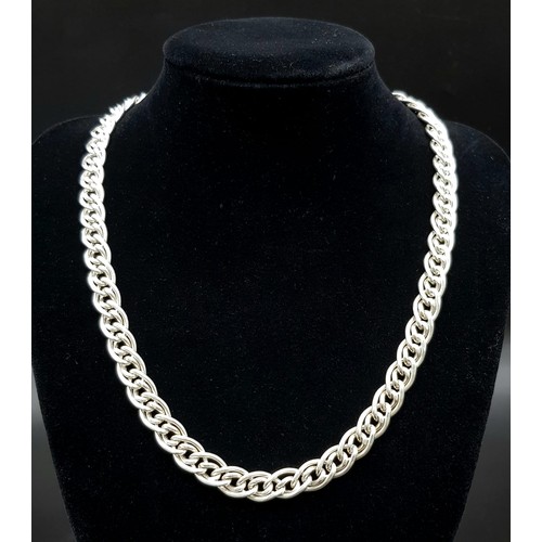 1700 - An Intricate Circular 925 Silver Link Necklace. 42cm. 51g total weight.