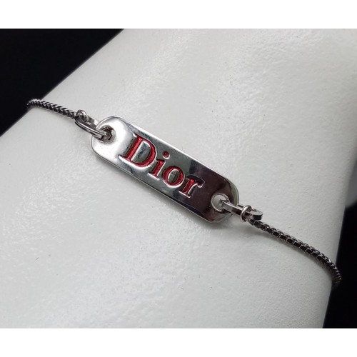 145 - A Christain Dior White Metal Tag Necklace and Bracelet. Both adjustable. Excellent condition. Comes ... 