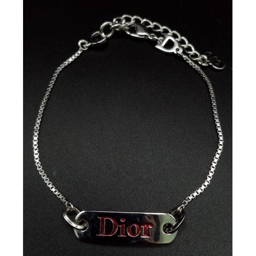 145 - A Christain Dior White Metal Tag Necklace and Bracelet. Both adjustable. Excellent condition. Comes ... 