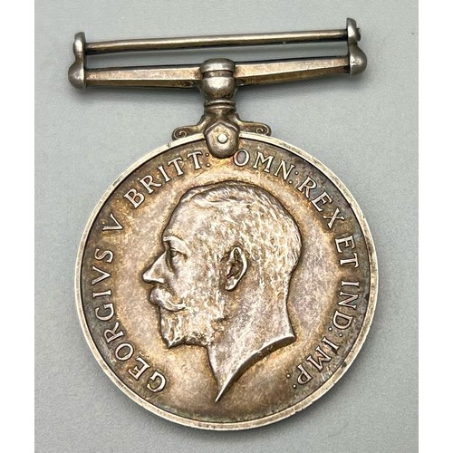 208 - A WW1 George V British Service Silver Medal. 1914-1918. This medal was presented to Pte Leonard V. J... 