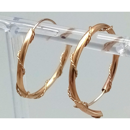 1189 - A Pair of 9K Yellow Gold Hoop Earrings. Rope twist design.
1.2g total weight.