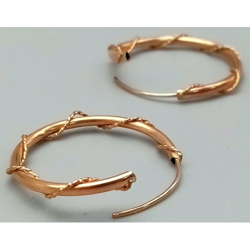 1189 - A Pair of 9K Yellow Gold Hoop Earrings. Rope twist design.
1.2g total weight.