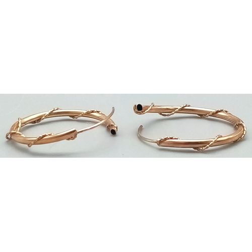 1189 - A Pair of 9K Yellow Gold Hoop Earrings. Rope twist design.
1.2g total weight.