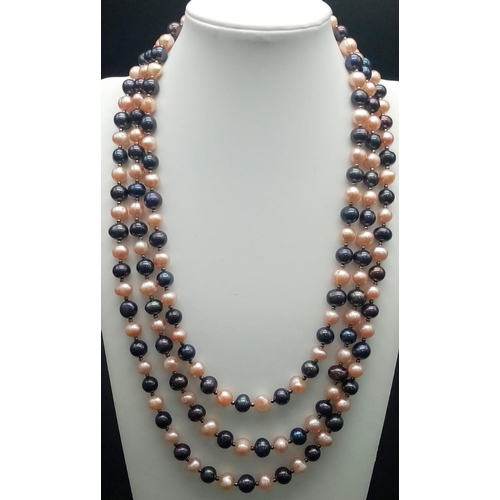 217 - A very desirable, three row, Tahitian black and pink pearls necklace and earrings set. Necklace leng... 