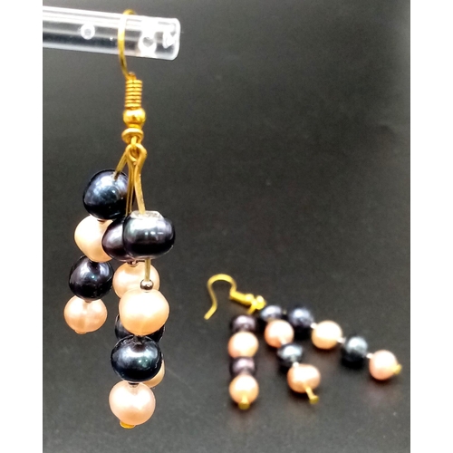 217 - A very desirable, three row, Tahitian black and pink pearls necklace and earrings set. Necklace leng... 