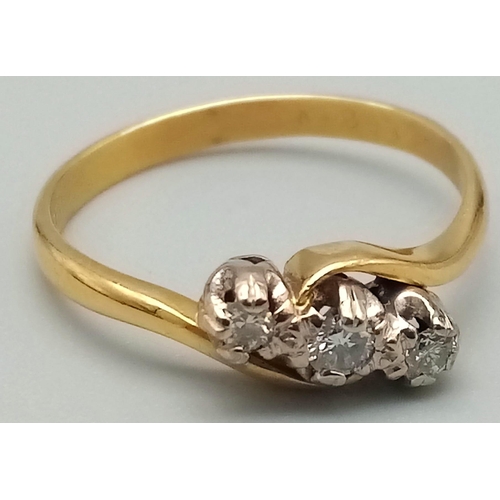 5 - A Vintage 18K Yellow Gold Diamond Trilogy Crossover Ring. Three bright round-cut diamonds. Size R. 3... 