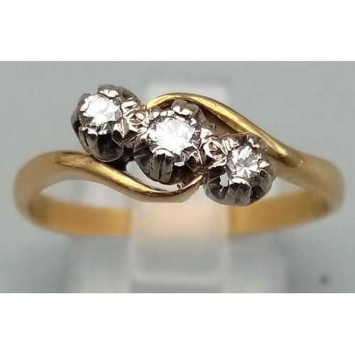 5 - A Vintage 18K Yellow Gold Diamond Trilogy Crossover Ring. Three bright round-cut diamonds. Size R. 3... 